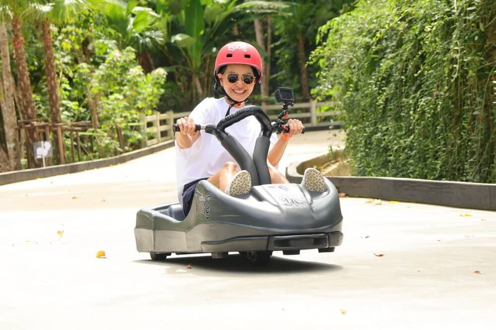 Luge riders on the Hanuman Luge track, included with World A+